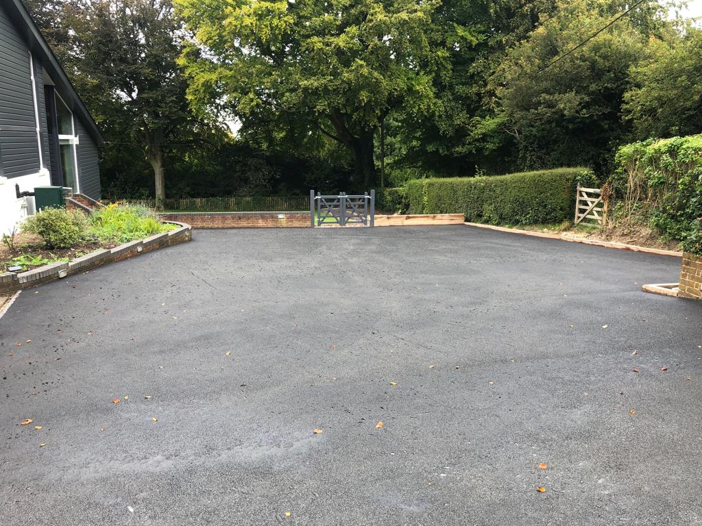 This is a photo of a bitumen driveway which is in the process of being installed by Chinchilla Asphalt & Bitumen Surfacing