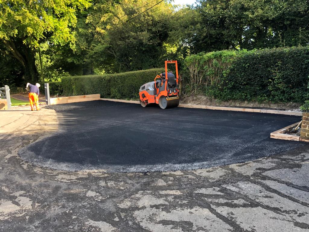 This is a photo of a bitumen driveway which is in the process of being installed by Chinchilla Asphalt & Bitumen Surfacing