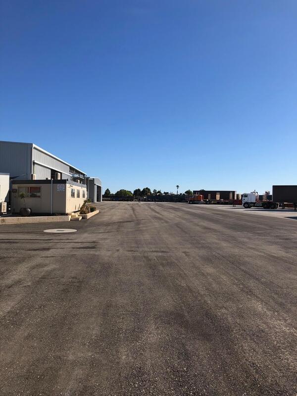 This is a photo of a hardstand driveway which is in the process of being installed by Chinchilla Asphalt & Bitumen Surfacing